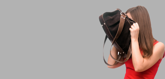 Lady looking into a big purse