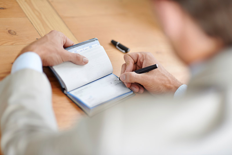 Man writing a check